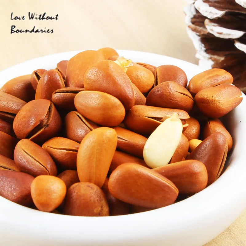 

Free shipping pine nuts Chinese special snack wild nuts Indian nut 250G/BAG