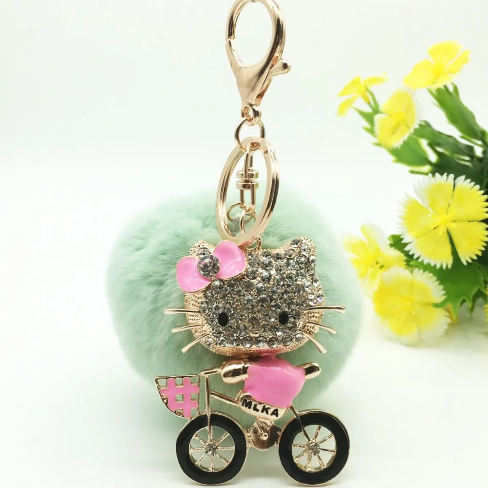 

2017 new trinket fake pompom keychain bunny keychains on bag rabbit fur Keychain fur pom pom charms for bags anime