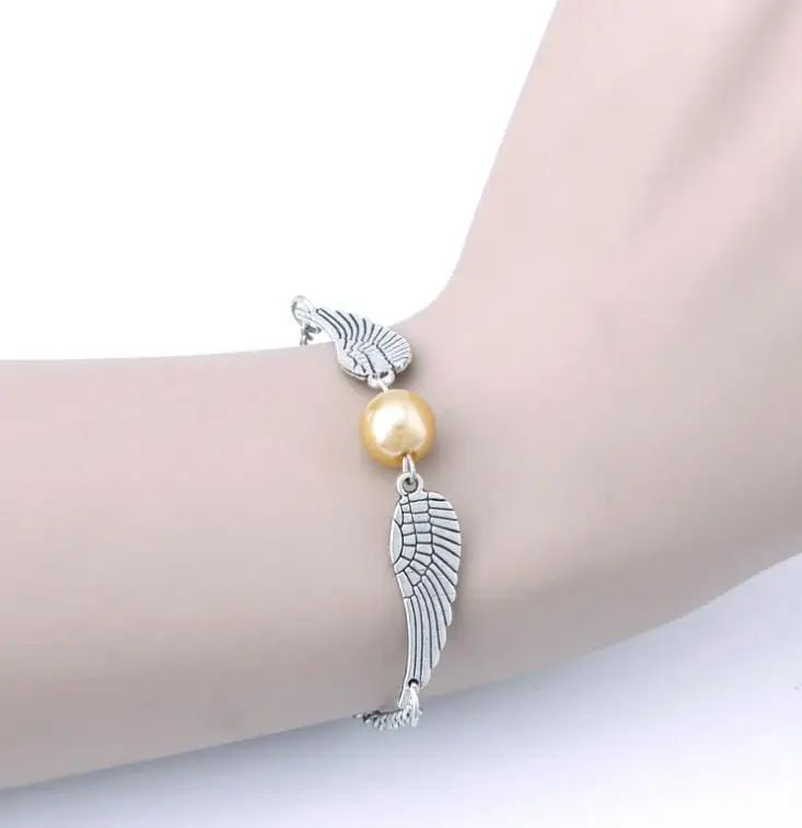 

Harri Potter Action Figures Deathly Hallows Golden Snitch Bracelet for Women and Men Cute Ball Wings Chain Action Figures Gifts