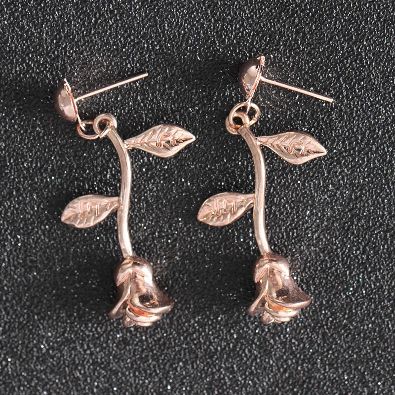 

2018 fashion earrings metal rose gold silver earrings Korean woman female rose flowers romantic delicate earrings wholesale