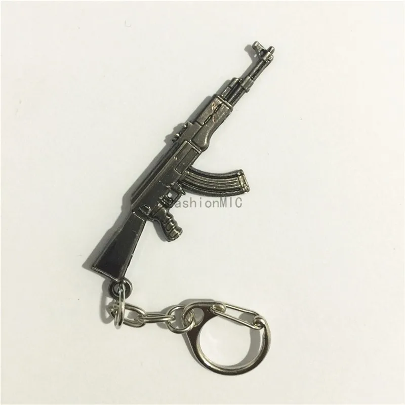 

Cross Fire AK47 Gun KeyChains Tritium Metal Keyring Key Holders For Best Friends Chaveiros Llaveros For Men Porta Porte Clef