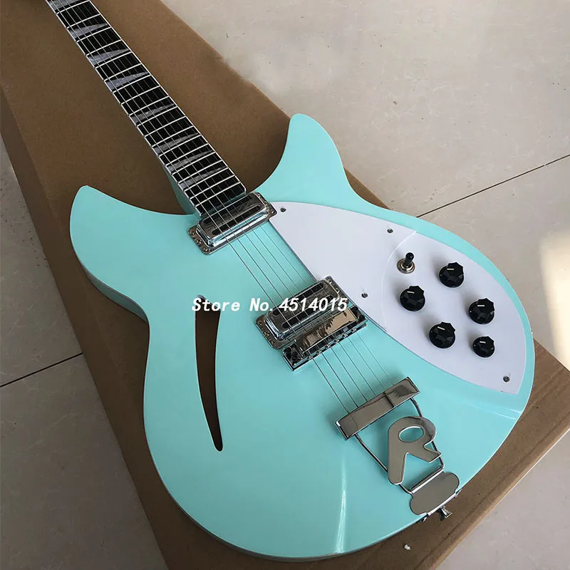 

2018 new Rick 360 electric guitar, Korean accessories, 6 string light green f empty band, half empty center, r bridge real photo