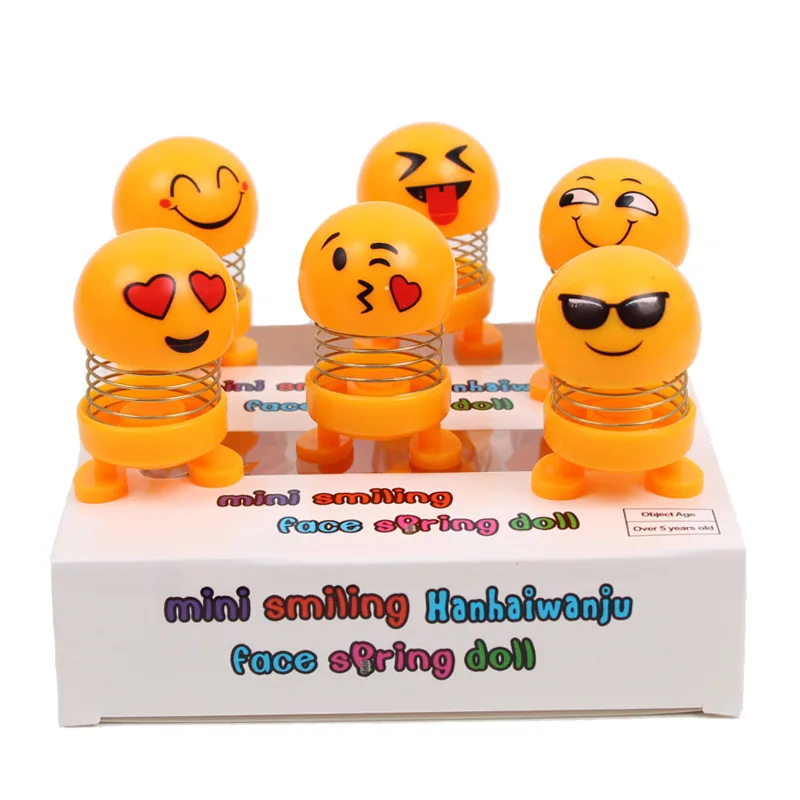

New mini cute funny shaking head smiley face spring doll Toy Home car toy ornaments cute funny expression pack toys for children