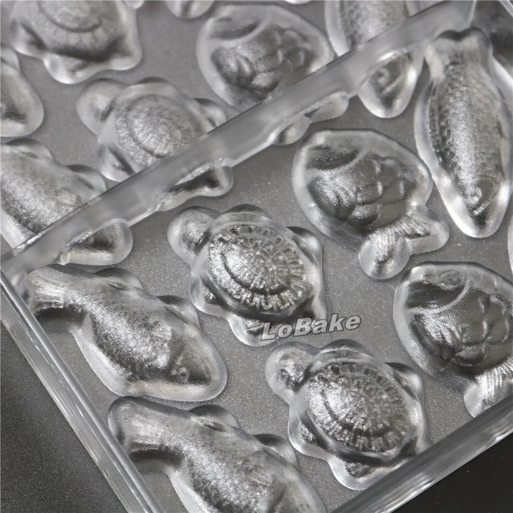 28 полостей океанские рыбы черепаха галобиос форма PC бисквитная форма Formas Para chocolate policarbonato moldes do Шоколадные инструменты
