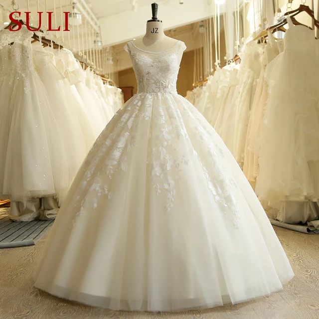 2018 cuello redondo ilusión corpiño perlas aplique vestido de novia
