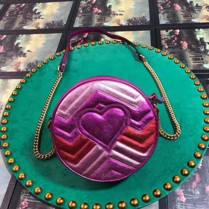 

The most stylish heart-shaped single-shoulder bag ofhas the highest quality and was designed by a female handbag designer