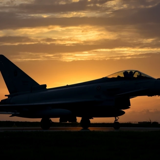 An Italian Air Force F-2000 Typhoon at sunset Poster Print (17 x 11)