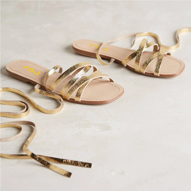 gold_strappy_sandals_lace_up_flats