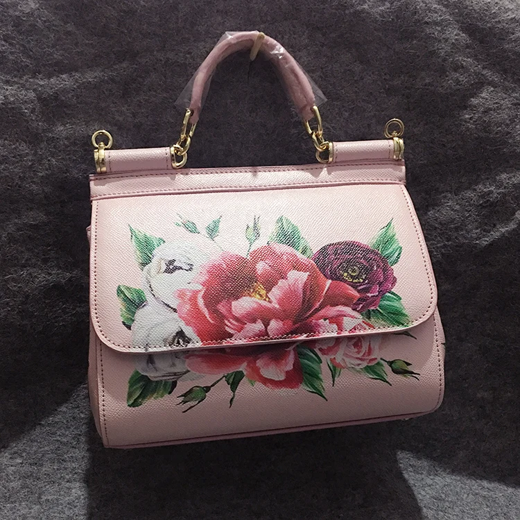 

2018 new series rose printed single shoulder skew spanning bag flower pattern color printing flip bag.