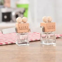 The Air Outlet Of Vehicle Car In Addition To Smell The Perfume With Empty Bottles With Essential Oils