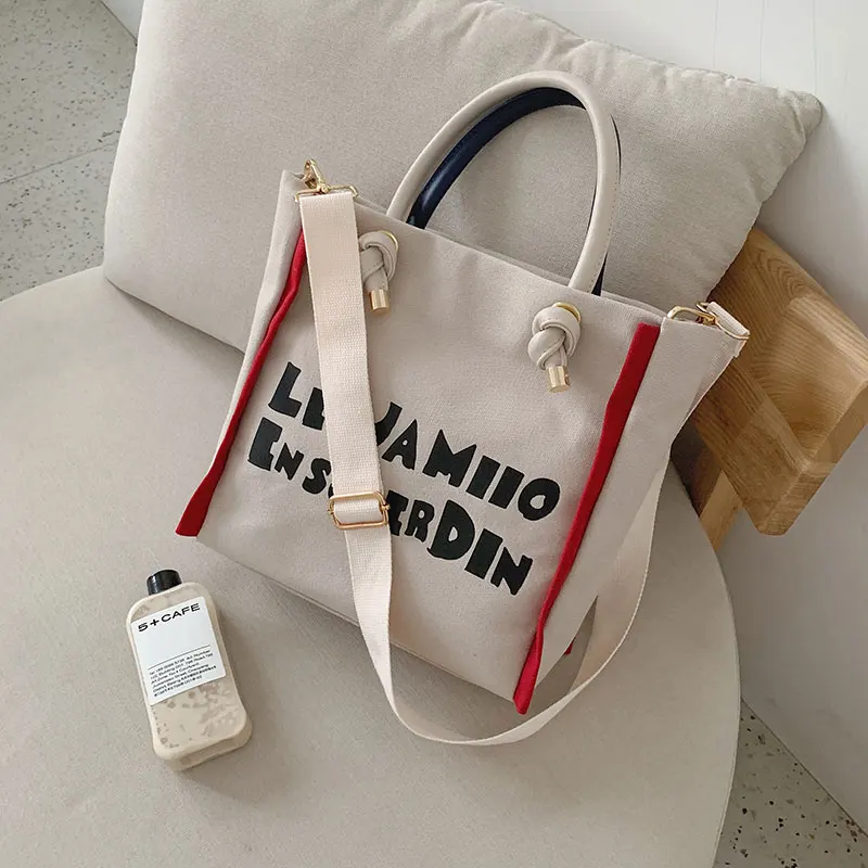 

ladies, the new Korean version of the large-capacity one-shoulder bags, fashionable 100-band canvas slanting tote bags