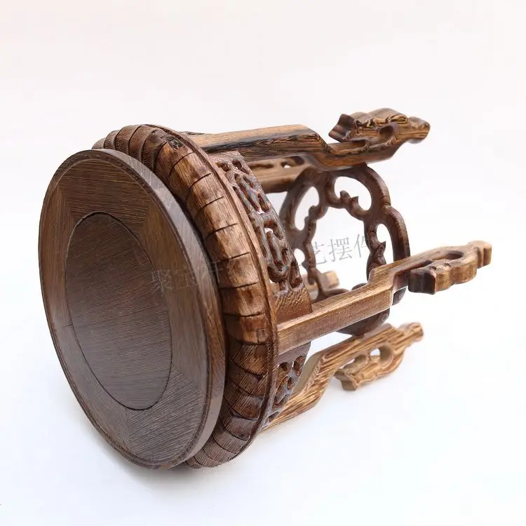 

Mahogany wenge satisfied a few ornaments handicraft furnishing articles solid wood round the base of blue and white porcelain