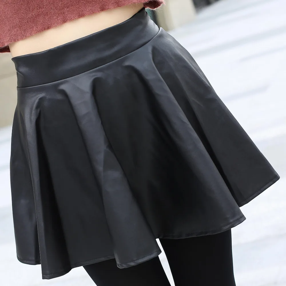 Женские повседневные короткие юбки на весну и лето, Женские однотонные свободные юбки большого размера плюс в стиле хип-хоп, плиссированные юбки из искусственной кожи S-2XL