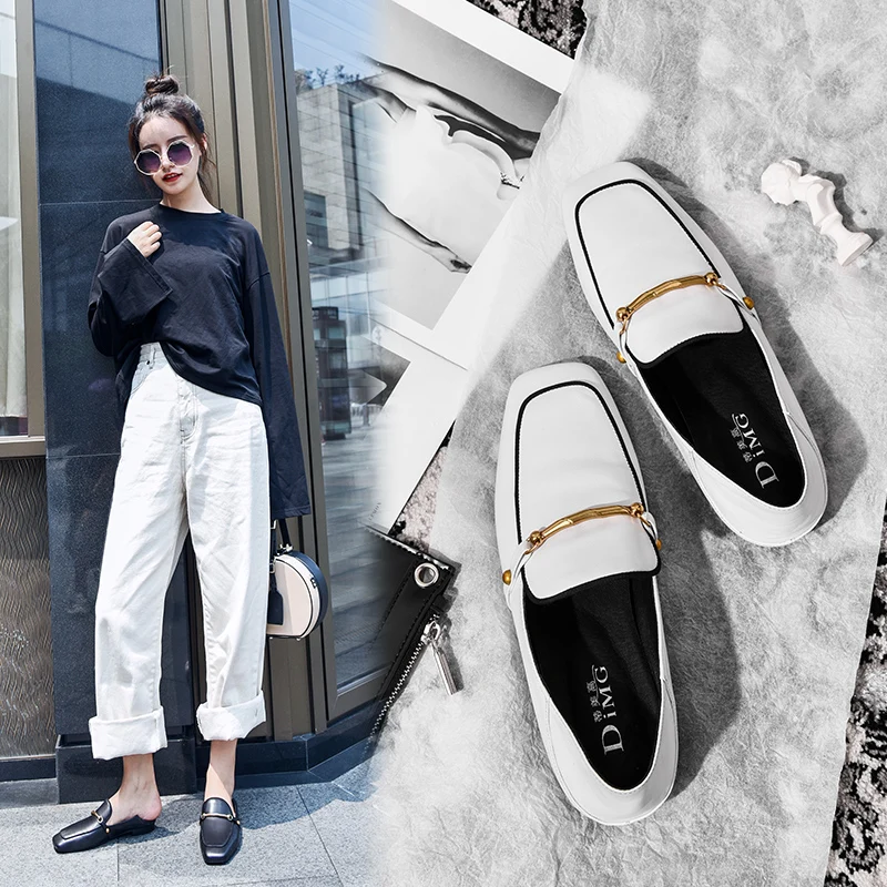 

2018 new flat black leather low heel thick with white square head two wear stepping with one foot wearing Lok Fu shoes.
