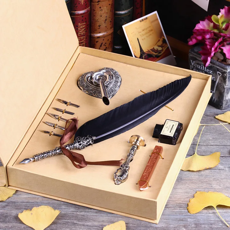 

Gift Box Vintage Harry Potter Metal Curved Natural Swan Feather Pen Set with 5 nibs, pen stand, Wax, Name Seal, Quil