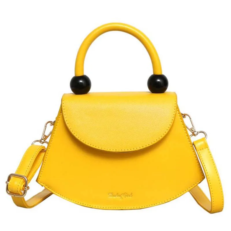 yellow purses and handbags