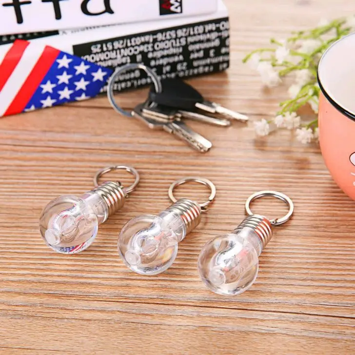 LED Flashlight Light Bulb Key Ring Keychain Lamp Torch Colorful color change Creative toys small gift activities presented pendant novelty jewelry 1