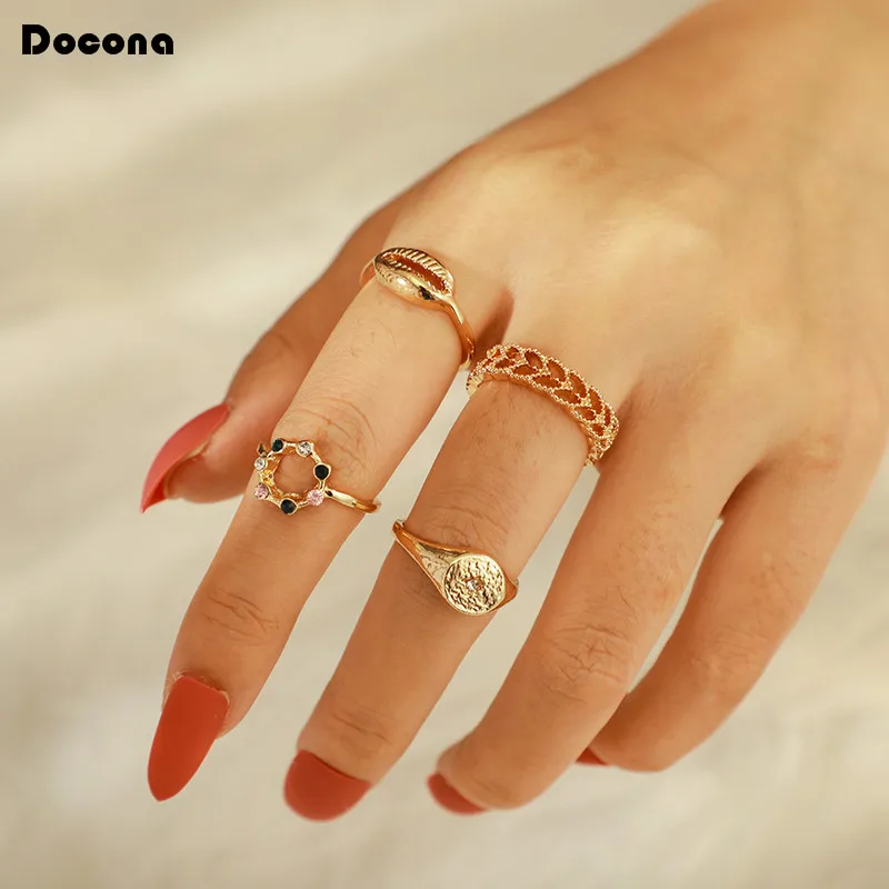 Doocna الصيف جديد منحوتة الجوف البوصلة الملونة حجر الراين قذيفة الذهب خواتم للنساء البوهيمي ميدي المفصل حلقة مجموعة 6992 Doocna الصيف جديد منحوتة الجوف البوصلة الملونة حجر الراين قذيفة الذهب خواتم للنساء البوهيمي ميدي المفصل حلقة مجموعة 6992