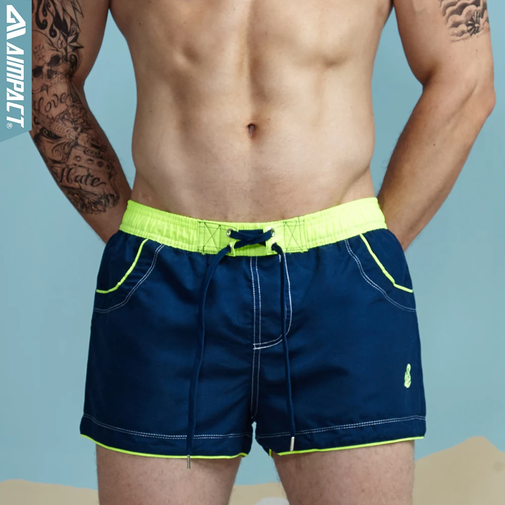 

Aimpact 2Pcs/Lot Men's Board Shorts Sexy Beach Bermuda Wear Sea Short Maillot De Bain Men's Board Short with Lining Liner 2AC429