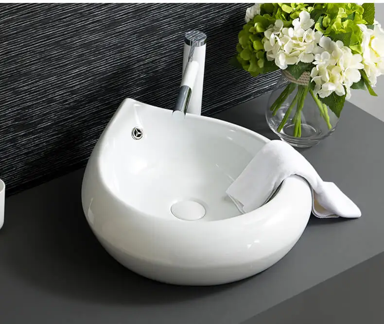 China Artistic Handmade Ceramic wash basin Lavobo Round Counter top ceramic art wash basin porcelain hand wash basin  (2)