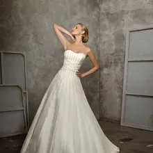 Дизайнерский свадебный наряд из органзы без рукавов