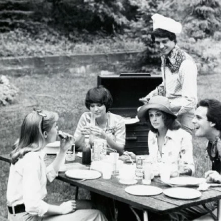 Two teenage boys and three teenage girls at a picnic Poster Print (18 x 24)