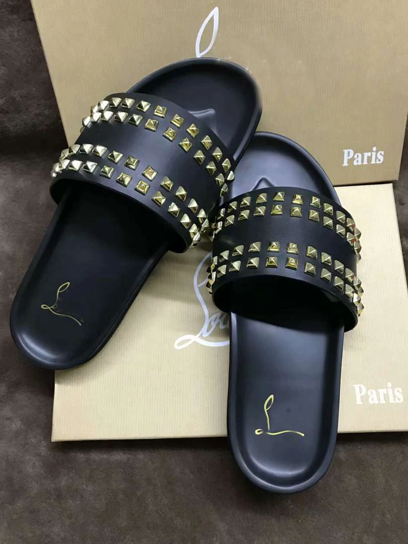 

Shoes woman luxury brand 2019 new rivet word drag sandals men and women with the same paragraph fashion beach shoes large size