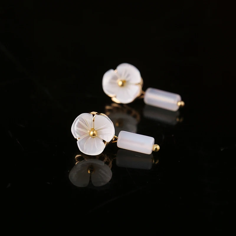 

Temperament earrings ethnic style simple flower earrings cold wind super fairy earrings