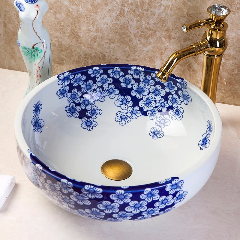 Керамическая синяя и белая раковина для ванной