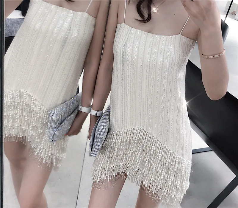 

Cakucool New High end Pearl Beading Tassels Dress Summer Festival Party Spaghetti Strap Dress Mini Asymmetric Bodycon Vestido