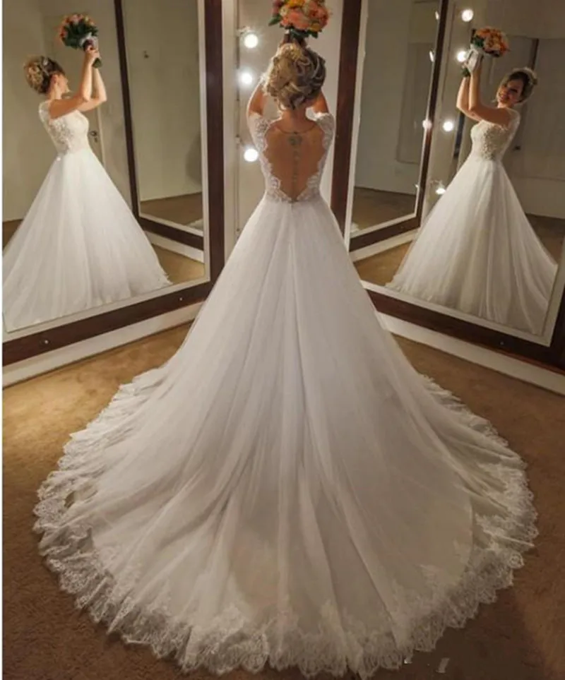 2018-a-line-wedding-dresses-elegant-v-neck-cap-sleeves-lace-applique-beaded-sheer-back-with-buttons-sequins-floor-length-arabic-bridal-gowns (3)