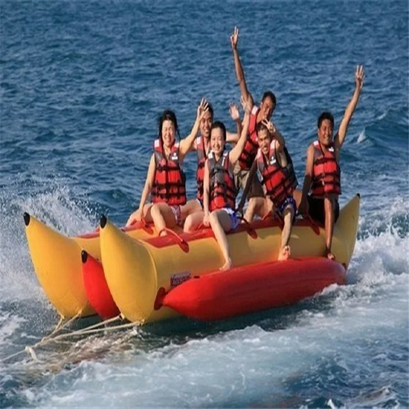 inflatable banana boat 6 people playing on the beach surf riding water game water toys inflatable banana boat 6 people playing on the beach surf riding water game water toys