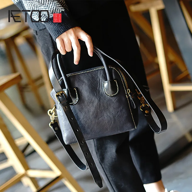 

AETOO Head leather handmade art retro small square bag, leather smiley face one-shoulder slanted female bag