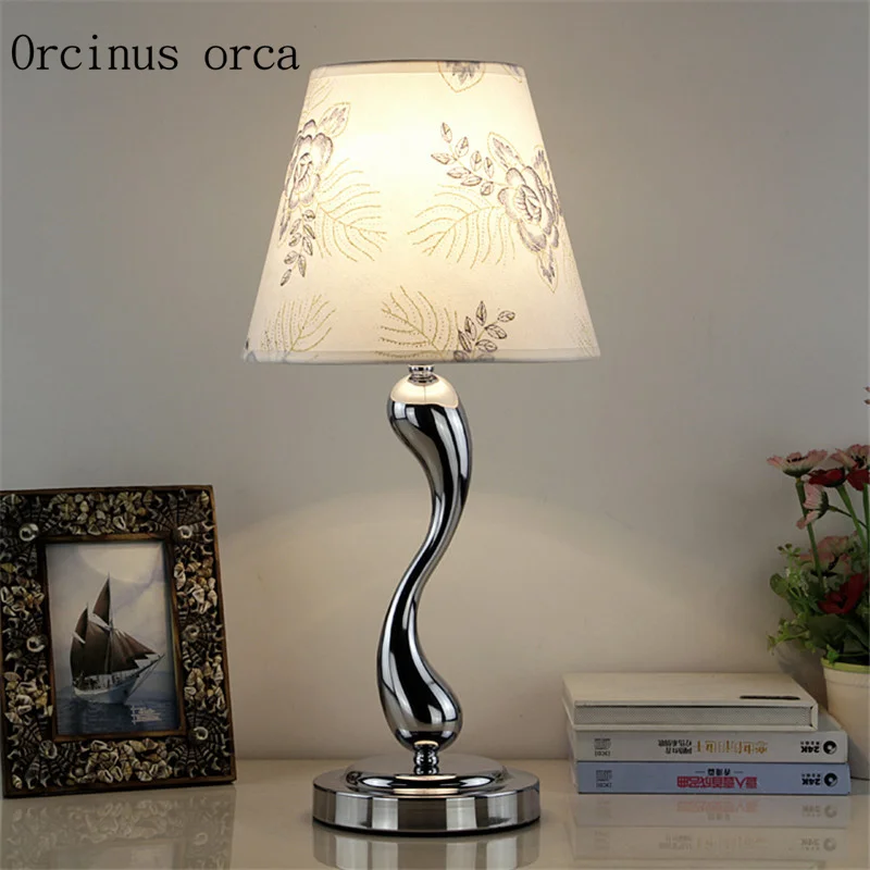 

Simple modern stainless steel wire drawing LED creative personality warm bedroom lamp bedside lamp