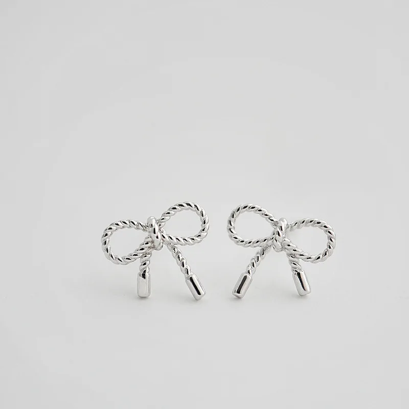 

Silver Fashion Jewelry Tiny Bow Stud Earrings Knot Ribbon Earrings for Women Birthday Gift wholesale