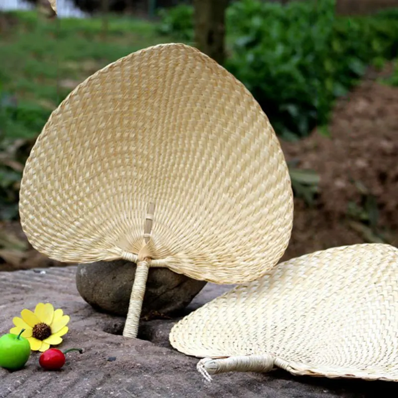 

Pure hand-made palm leaf Palm weaving fan solid color dance straw hand-cranked fan baby Naoliangcao environmental protection fan