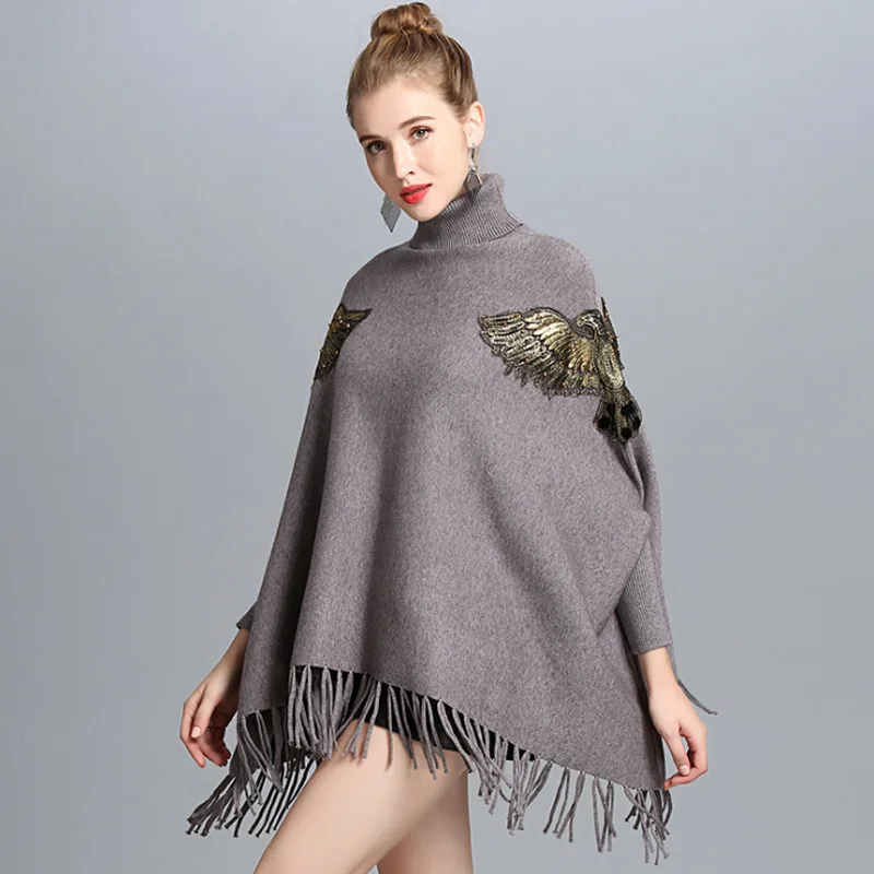 

ZDFURS*2018 Autumn Winter Long Knitted Women Eagle Appliqued Sweater Fashion Long Batwing Sleeves High Neck Stole Tassel Poncho