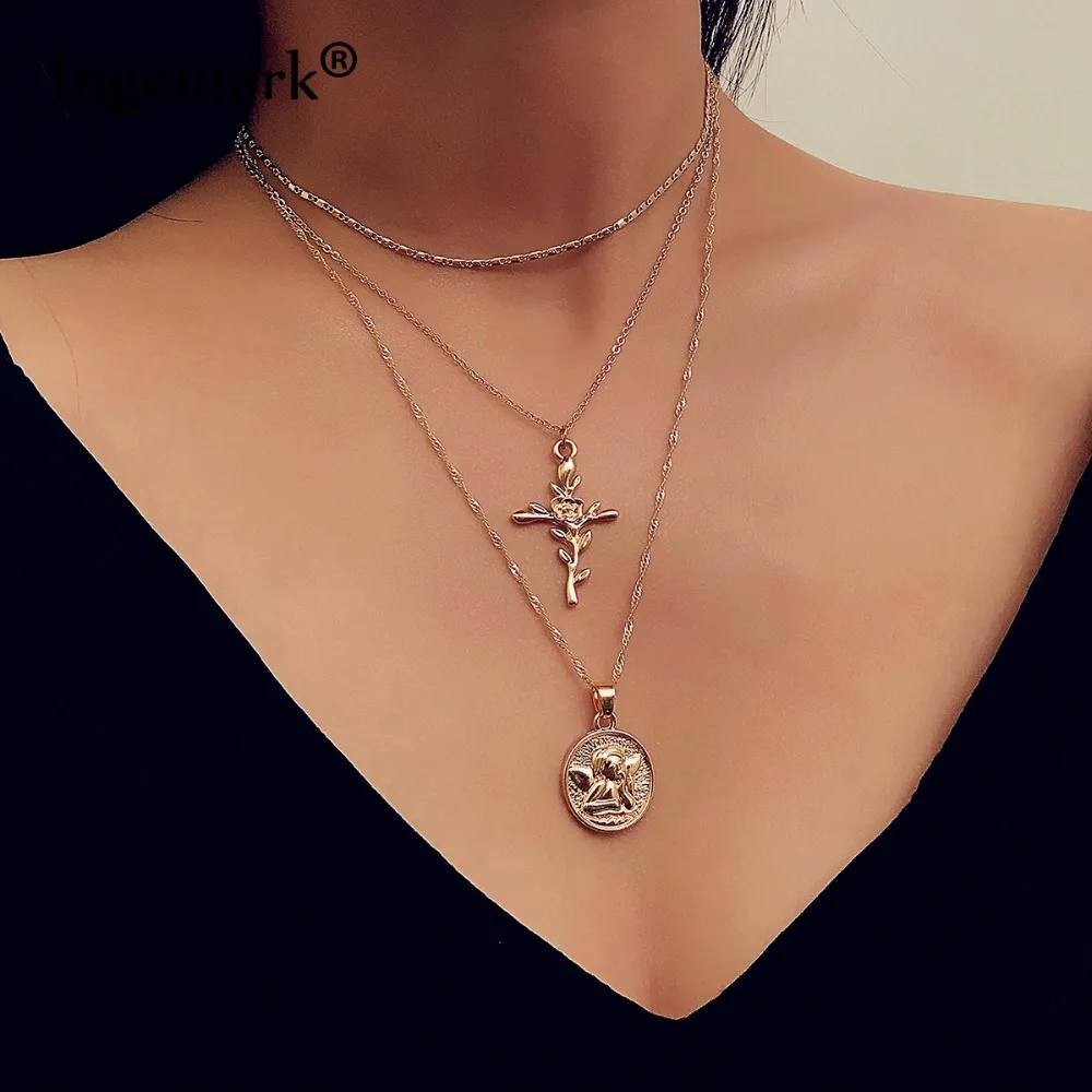 

Ingemark Boho Rose Flower Cross Pendant Choker Necklace Women Vintage Carved Coin Angel Long Chain Necklace Christian Jewelry