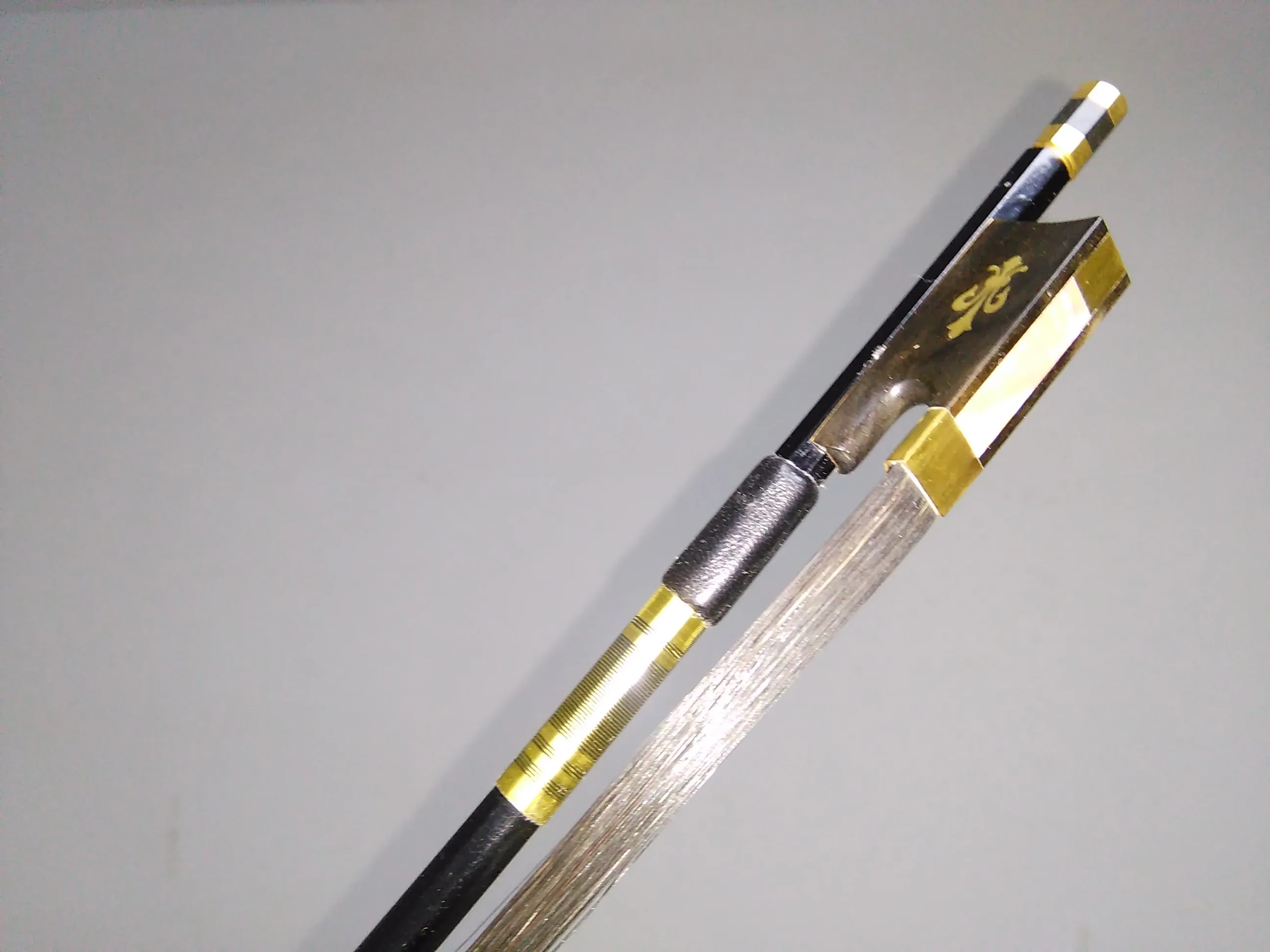 

1 PC Full black carbon fiber Violin bow with carved flower ebony frog black horse tails 4/4