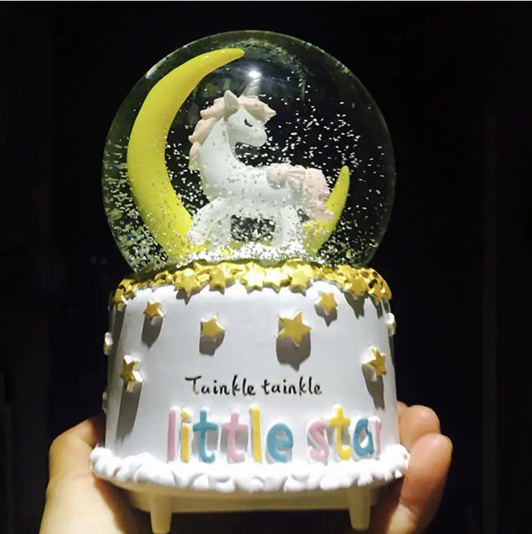 

YM 727 New automatic snowflake lighting creative cartoon moon little Ma Baoli crystal ball music box decoration