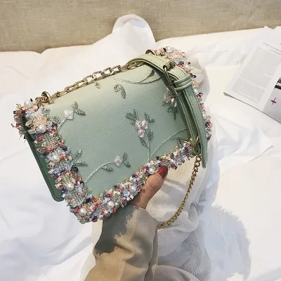 

Personality Design Luxury Embroidered Flower pearl Handbags Women National style Rivets Shoulder Bags Crossbody Bag For Female