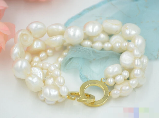 

free shipping 09457 4row white baroque rice freshwater pearl bracelet