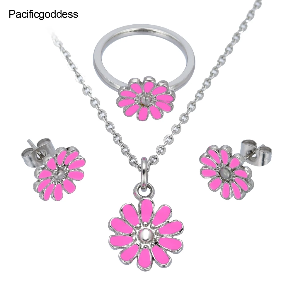 

earrings necklace and rings set in stainless steel jewelry