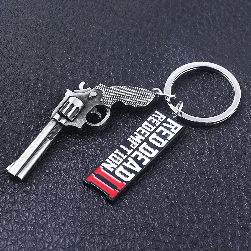 

Game Red Dead Redemption 2 Keychain For Men West Cowboy Gun Metal Key chain For Keys Men Car Women Bag Accessories