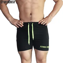 GYMLOCKER бутик тренажерные залы Бодибилдинг мужские Пляжные шорты джоггеры пот Штаны сжатия быстро сохнет Фитнес укороченные штаны мужские