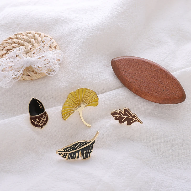 

Autumnal Fallen leaves Pine cone Acorn Apricot Leaf Brooches Denim Jackets Shirt Lapel Enamel Pin Natural Plant Jewelry