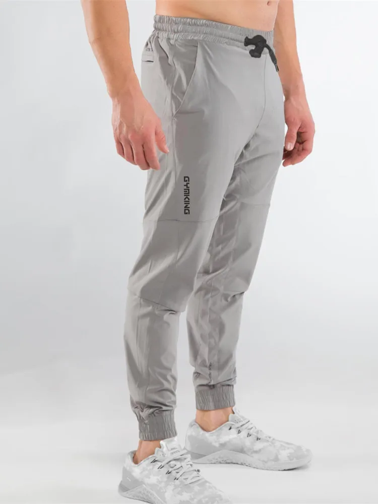

YEMEKE New 2019 Men Pants Fashion Fitness Sportswear Joggers Trousers Mens Streetwear Track Pants Gyms Sweatpant pantalon hombre