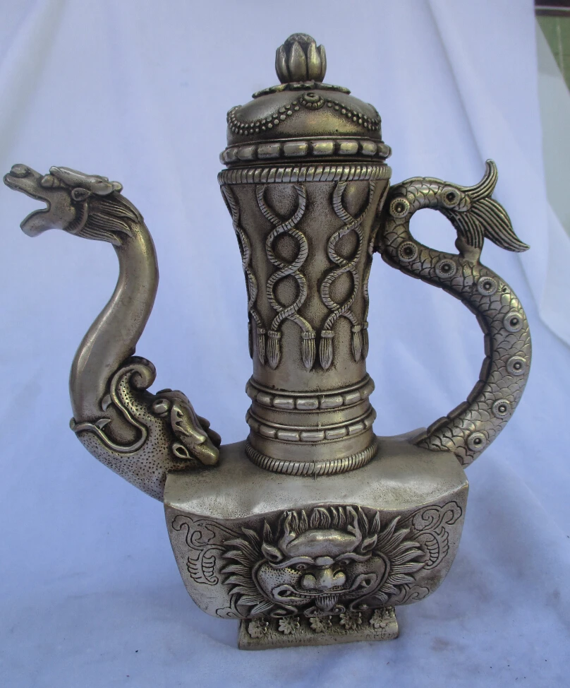

Collectible Decorated Old Handwork Tibet Silver Carved Lion Dragon Teapot/Flagon Free shipping 000017