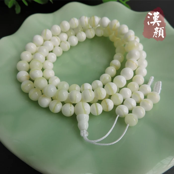 

Natural gold Tridacna 6mm8mm108 positive pieces of prayer beads bracelet76