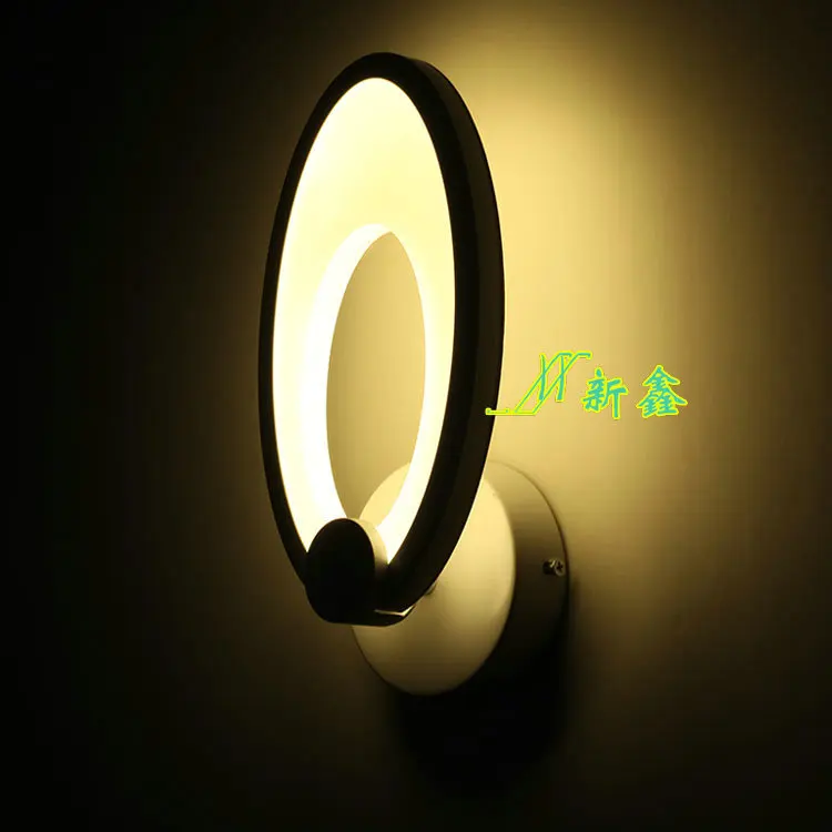 

Rabbit ears LED patch, elliptical acrylic wall lamp modeling, iron art wall lamp, simple fashion.